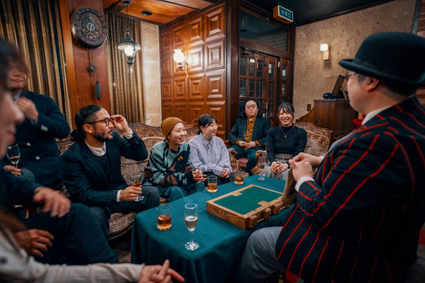 istock Magician performing a small magic show at a restaurant 1474152171
