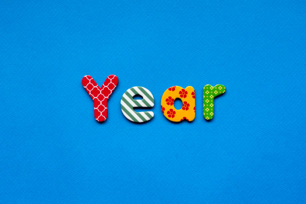 istock colored word year on  blue paper background 1474160293