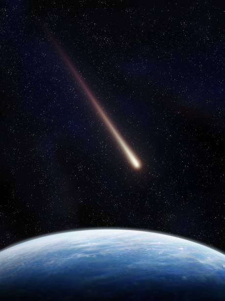 Comet is moving towards the Earth. Celestial body is approaching our planet. A meteorite glows in the starry sky.