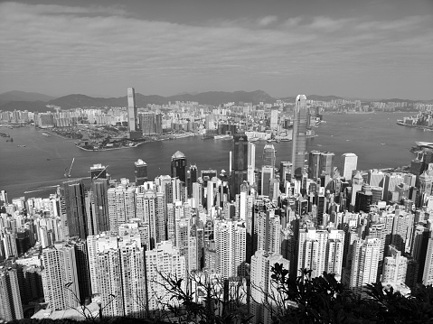 Hong Kong cityscape and Victoria Harbour, viewed from lugard road at the famous Victoria Peak.