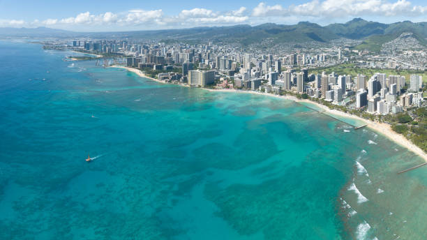 istock Honolulu city with blue sky and clouds 1474165370