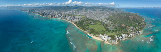 istock Honolulu city with blue sky and clouds 1474165371