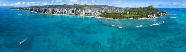 istock Honolulu city with blue sky and clouds 1474165372