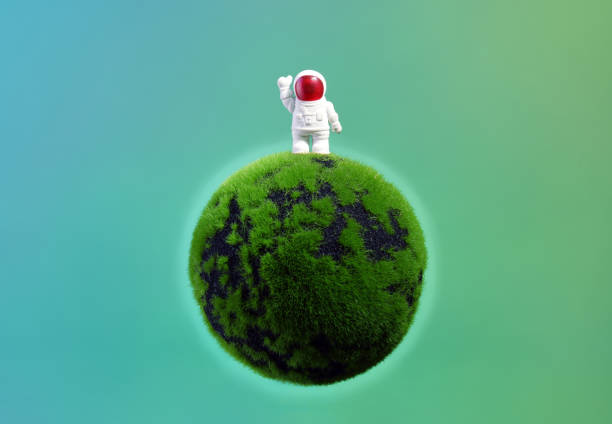 istock Funny astronaut  on a green planet 1474166491