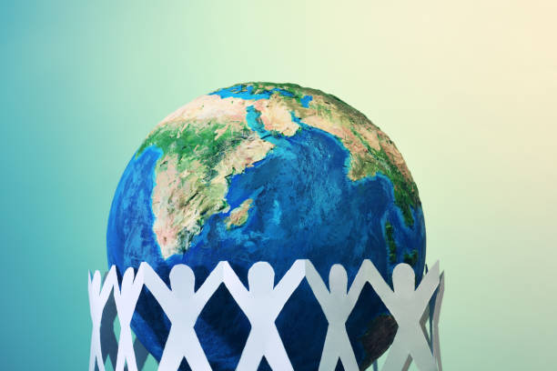 istock Earth globe with paper men 1474166494