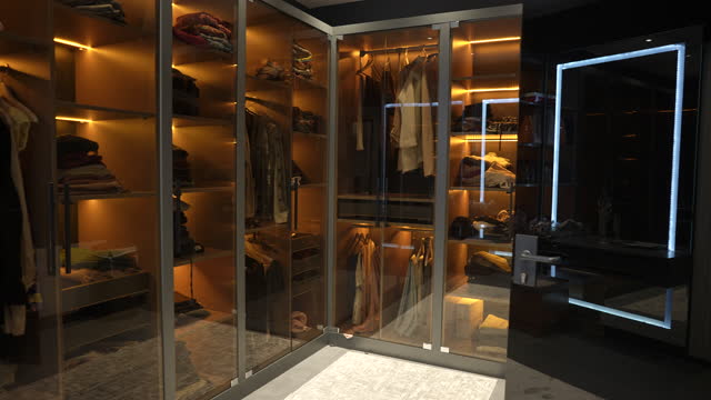 Modern women dressing Room Interior With Shoes, Bags And Hanging Clothes
