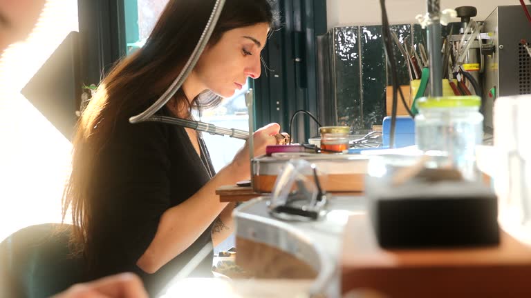 Woman jeweller working