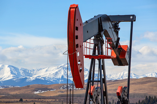 Oil and gas pumpjacks at locations in Western Canada