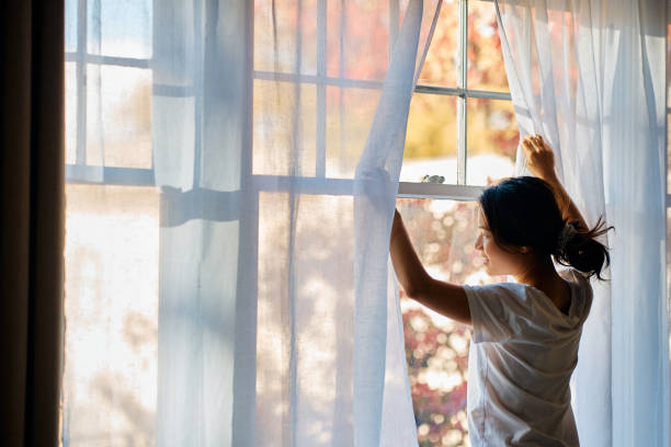 istock Letting the sunshine into her life! 1474183369