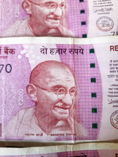 istock Indian money and banknotes, 500 rupees and 2,000 rupees notes 1474184956