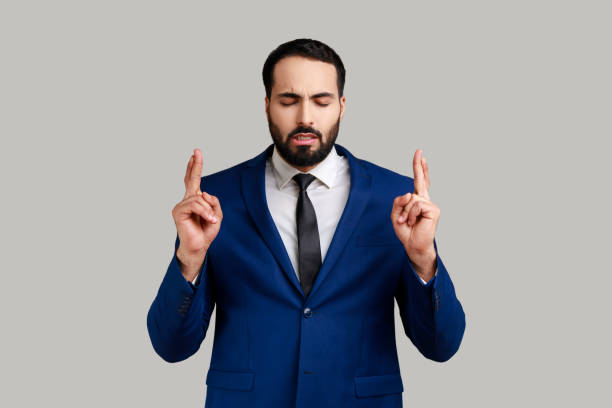 istock Bearded man showing time out gesture, looking with imploring eyes, hurry to meet deadline. 1474185101