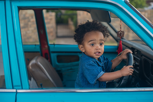 Close up portrait of boy in vehicle