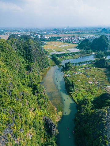 aerial view of canoes in River in Tam Coc, ninh binh district, vietnam