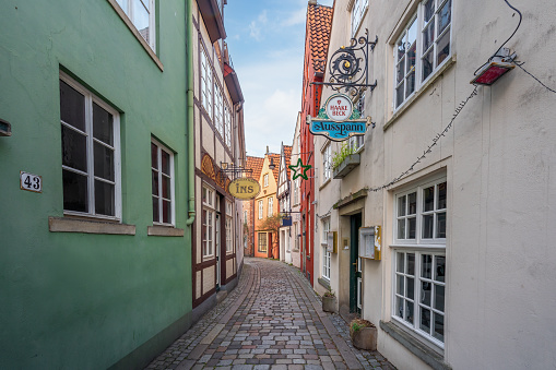 Bremen, Germany - Jan 7, 2020: Old houses at Schnoor quarter streets - Bremen, Germany