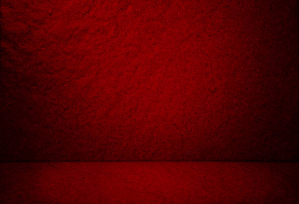 istock soft red studio background. red abstract stone cement floor and wall backgrounds, room, interior, for display products. montages background for product showcase. empty room grungy stage backdrop. 1474196809