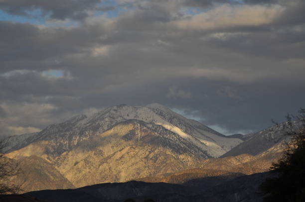 istock Soft colors of sky painted these soft-colored mountains 1474197218