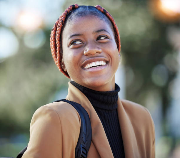 istock Face, happy black woman and student at park ready for learning, studying and education. Scholarship, freedom and smile of female lost in thoughts, thinking and contemplating knowledge outdoors alone. 1474202537