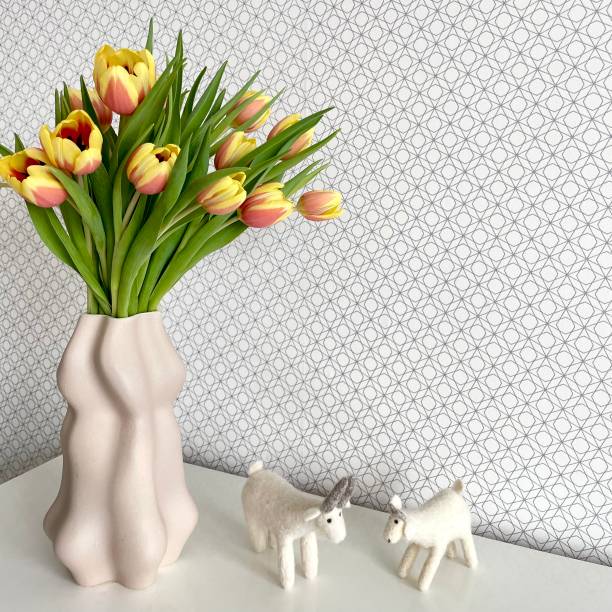 istock Stylish room tulips and goat ornaments 1474205192