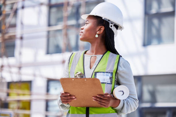 istock Architecture, checklist and project management with black woman at construction site for civil engineering, designer and building inspection. Industrial, vision and planning with construction worker 1474206512