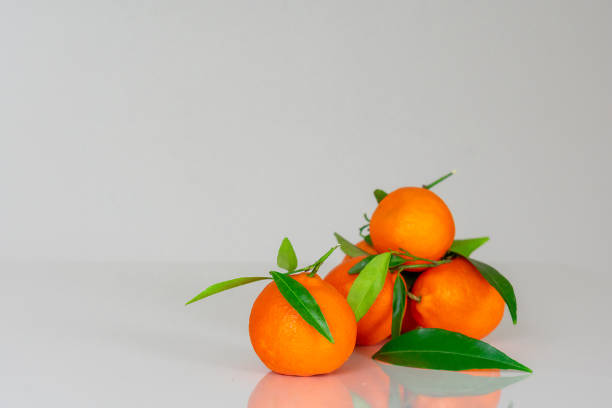 istock fresh tangerine fruits with leaves 1474206577