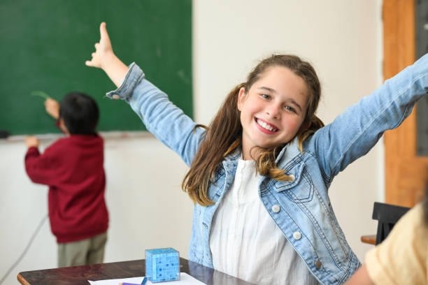 istock Kids education knowledge, Child in classroom at school 1474209830