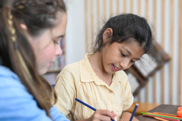 istock Kids education knowledge, Child in classroom at school 1474210747
