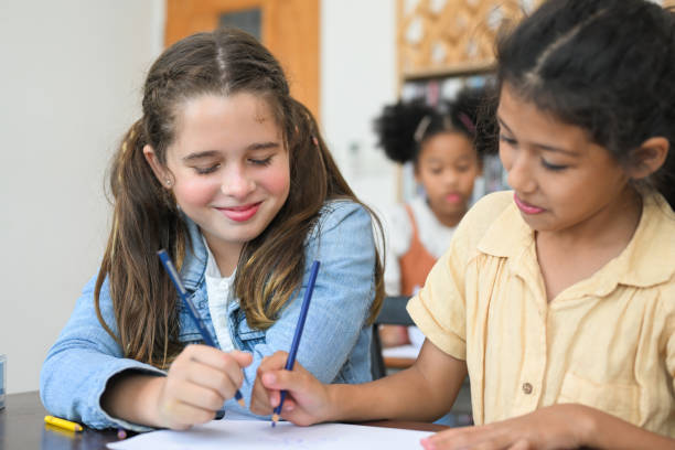 istock Kids education knowledge, Child in classroom at school 1474210801