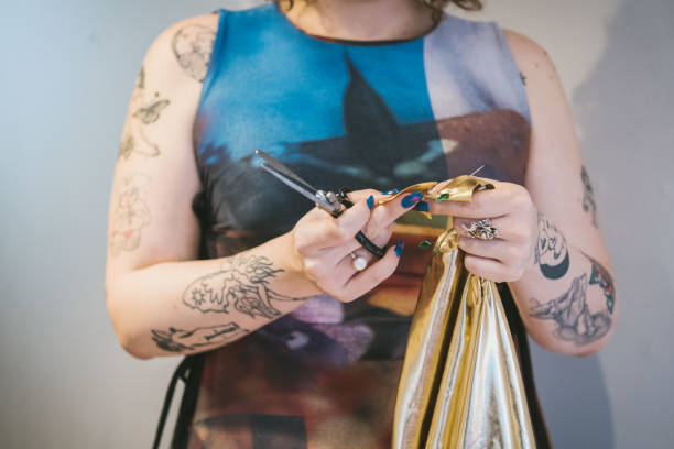 istock woman cutting fabric 1474218282