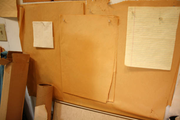 istock Old papers tacked to the wall 1474219160