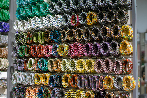 View of bracelets in various colors on a bijouterie store.