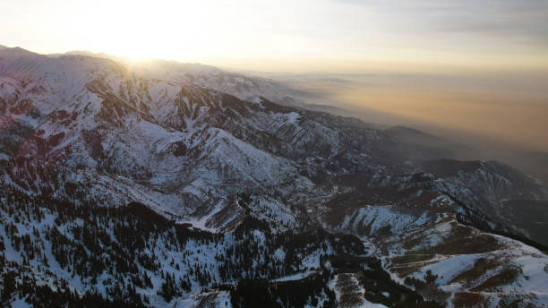 istock Epic red-orange sunset in high snowy mountains 1474219929