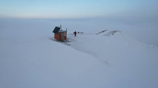Rescue hut high in the mountains among the clouds