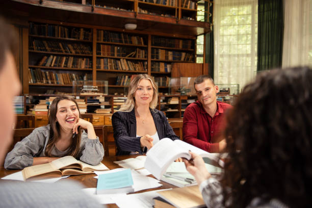 istock Group of students studying together at the University library 1474222228