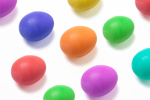 Colored eggs on a white surface
