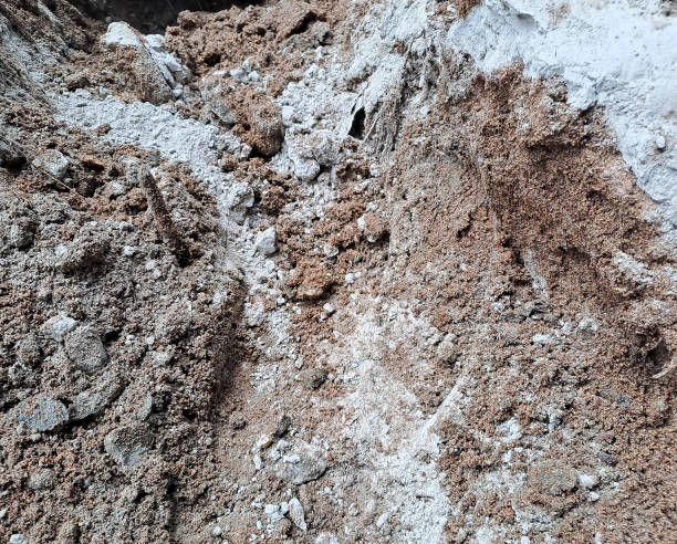 istock close up cement powder with sand. Construction worker 1474236904