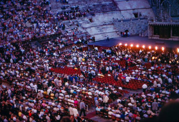 1989 old Positive Film scanned, roman amphitheatre - Verona Arena, Verona, Italy Verona, Italy - July 9, 1989: 1989 old Positive Film scanned, tourists are waiting for the start of the opera in the arena, Verona, Italy. verona opera stock pictures, royalty-free photos & images