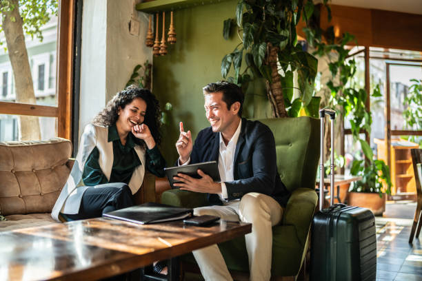 Colleagues having a meeting at a coffee shop