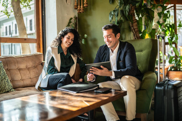 istock Colleagues having a meeting at a coffee shop 1474237772