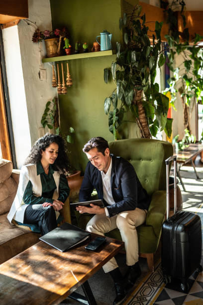 istock Colleagues having a meeting at a coffee shop 1474237776