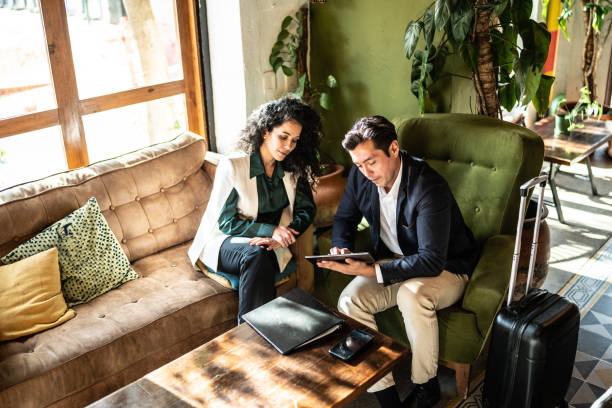 istock Colleagues having a meeting at a coffee shop 1474237777