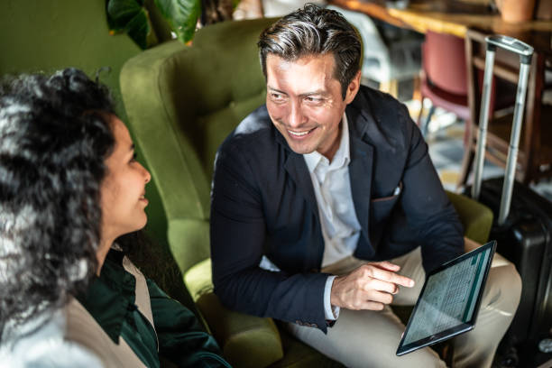istock Colleagues having a meeting at a coffee shop 1474237795