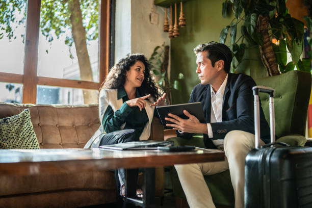 istock Colleagues having a meeting at a coffee shop 1474237807