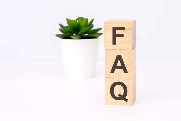 istock text FAQ on wooden blocks in white background with copy space, learning concept. 1474237982