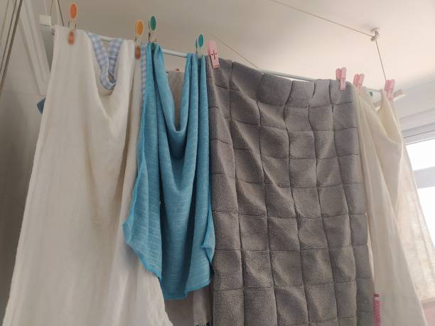 istock Clothes and rags drying on a clothesline 1474248935