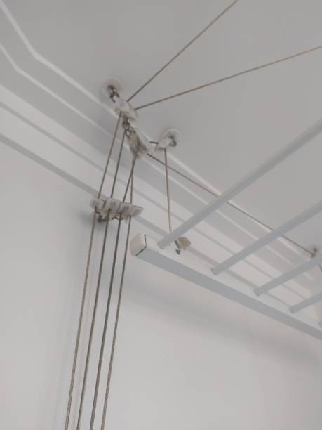 istock Ropes, cords and pulleys of a clothesline 1474249033