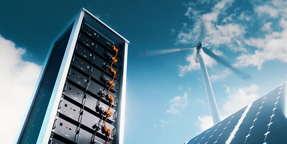 The picture shows the energy storage system in lithium battery modules, complete with a solar panel and wind turbine in the background. 3d rendering.