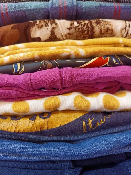istock A pile of assorted ironed and folded clothes 1474257663