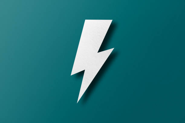 istock Paper cut lightning shape, lightning with light and shadow. placed on a green paper background 1474261792