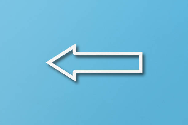 istock white paper arrow isolated on light blue paper background 1474262003