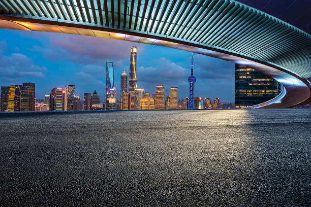 istock Shanghai skyline and road at night 1474265315